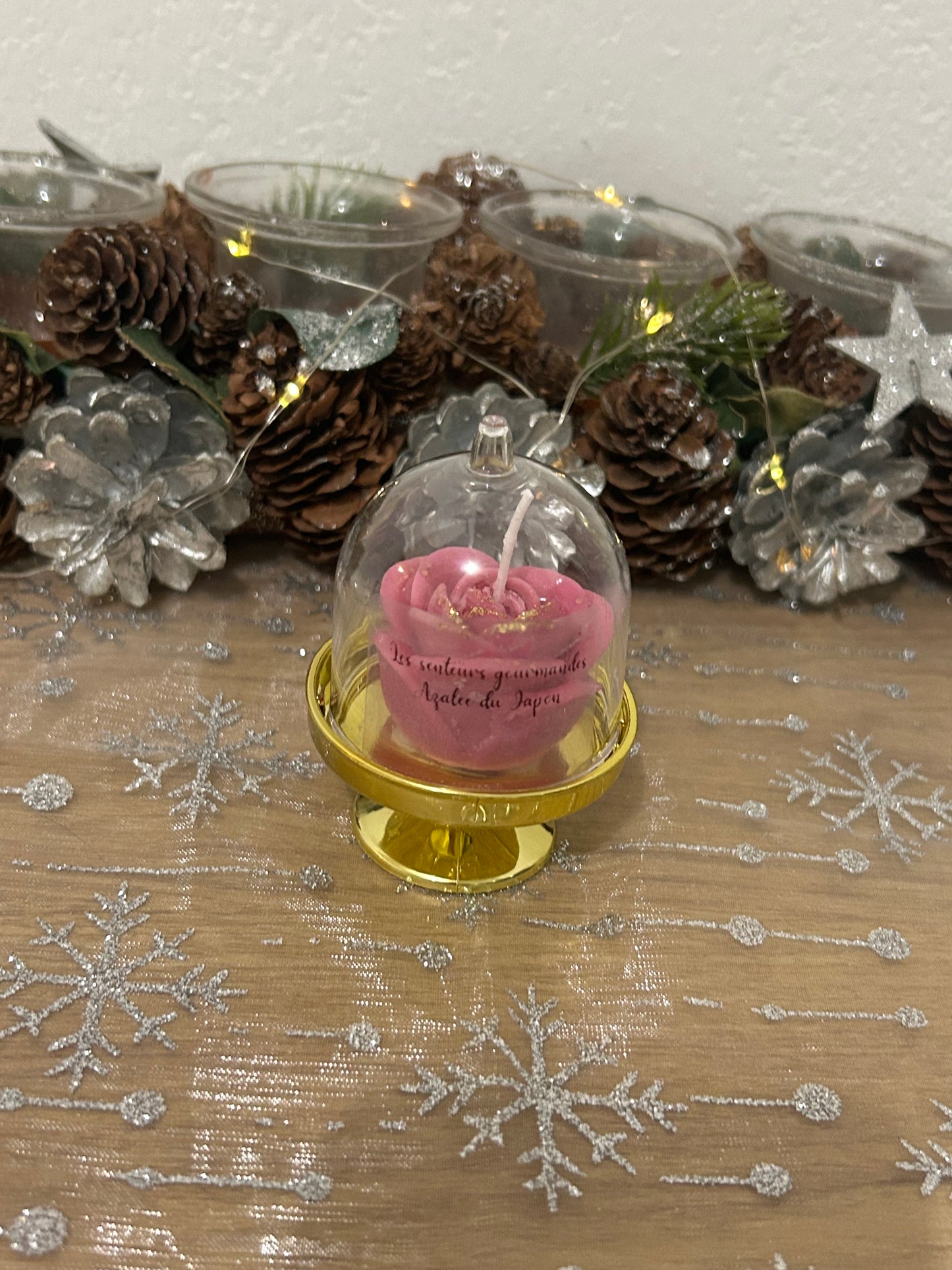 Cloche avec une fleur en bougies