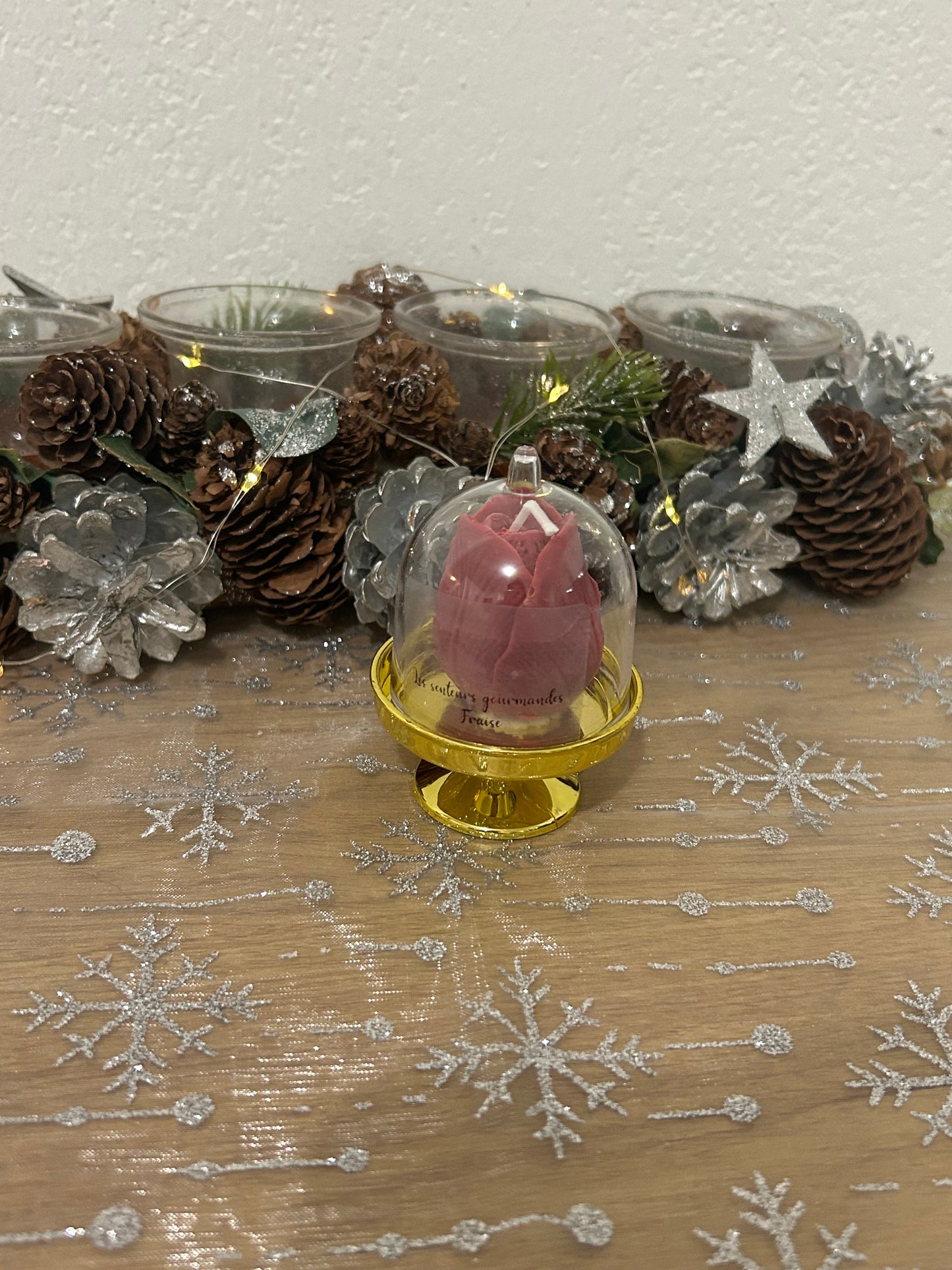 Cloche avec une fleur en bougies